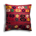 Traditional flower and leaf embroidered cushion cover by Turkish Bath & Home with intricate hand embroidery on fabric.