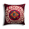 Traditional motif hand embroidered cushion cover from Turkish Bath & Home with intricate colorful embroidery on fabric.