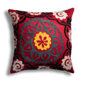 Hand embroidered Suzani cushion cover by Turkish Bath & Home featuring vibrant, intricate floral embroidery on fabric.