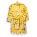 Turkish Bath & Home Every Day Flat Weave Robe, soft woven fabric, beige color, casual style, displayed hanging on a hook.