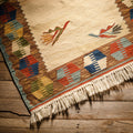 Turkish Usak Kilim rug with intricate geometric patterns, vibrant colors, handmade wool, traditional Turkish design from Turkish Bath & Home