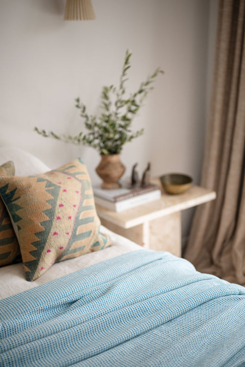 Turkish Bath & Home criss cross lightweight bed cover throw with a soft, woven design perfect for bedroom decor.