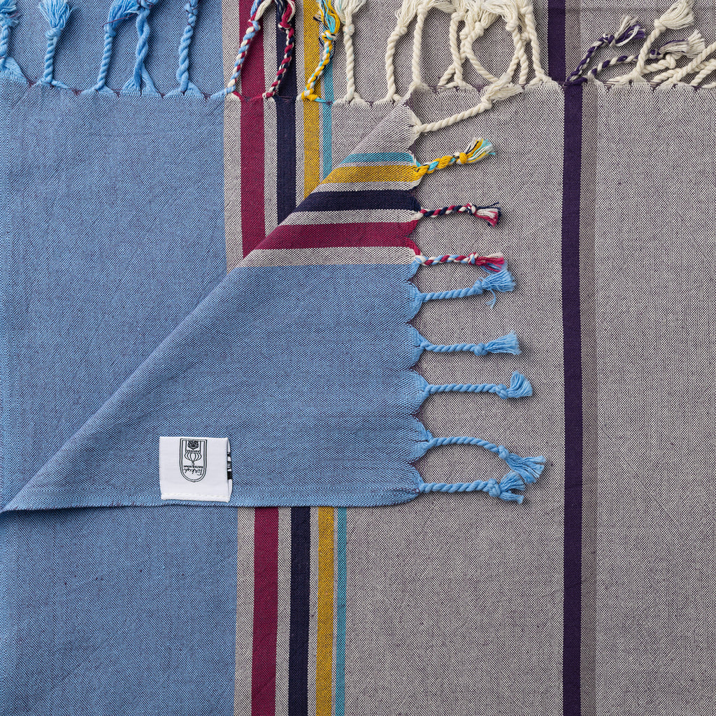 Lightweight Turkish Bath & Home towel with modern multicolor stripes in blue and mauve, soft and stylish for everyday use.