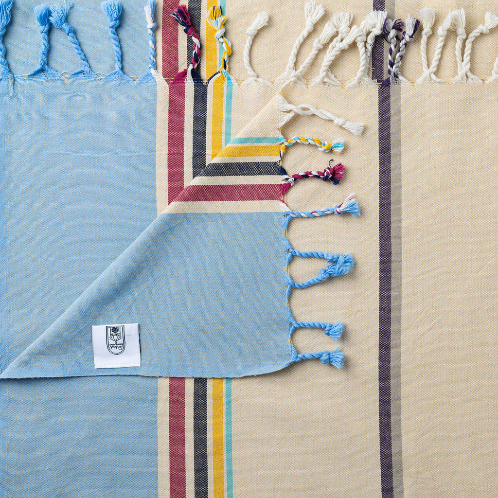 Turkish Bath & Home modern multi stripe lightweight towels in sky blue with colorful horizontal stripes, soft and absorbent.