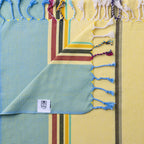 Turkish Bath & Home modern multi stripe lightweight towels in sunflower green with vibrant colorful stripes.