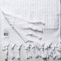 Small seamed thick looped hand towel by Turkish Bath & Home featuring plush, textured loops for absorbency and softness.