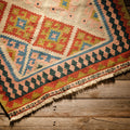 Vintage Afshar Kilim runner from Iran featuring traditional geometric patterns, crafted by Turkish Bath & Home.