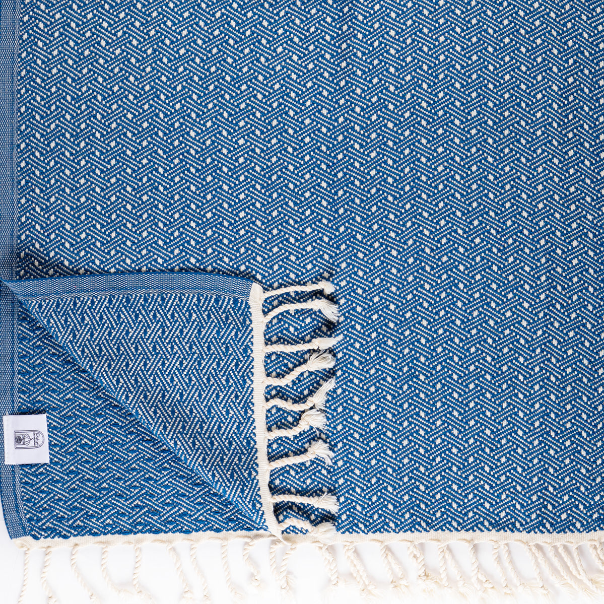 Navy dot hand towel with tassels