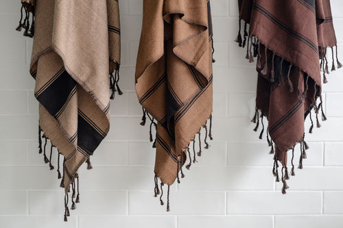 Lightweight Turkish Bath & Home chocolate bold stripe towel with stylish design, perfect for home or travel use.